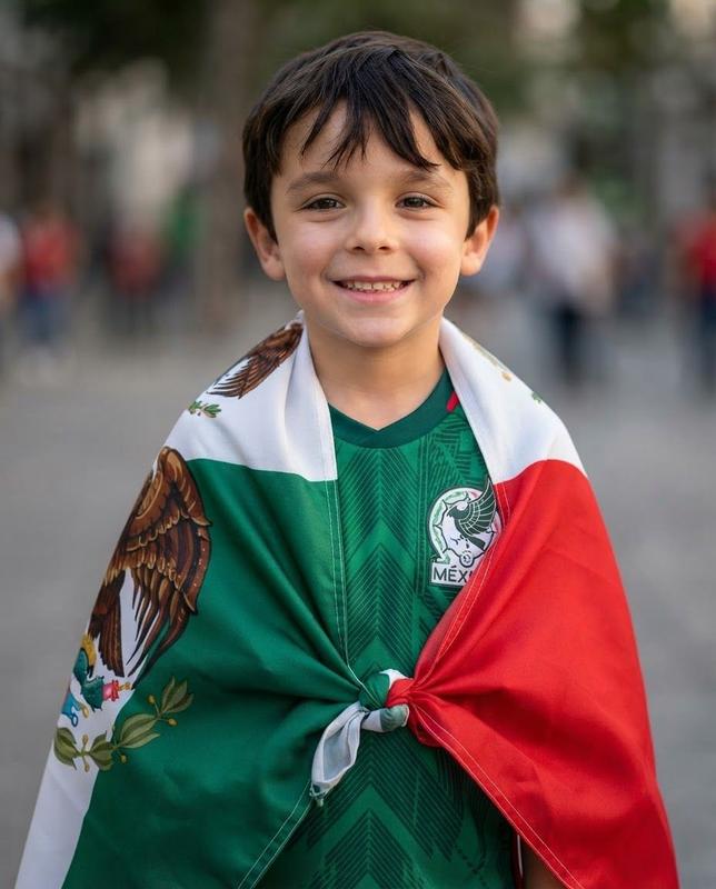 Mexico fan, wrapped in the flag